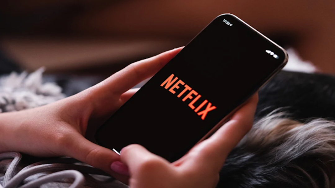 A smartphone streaming Netflix.