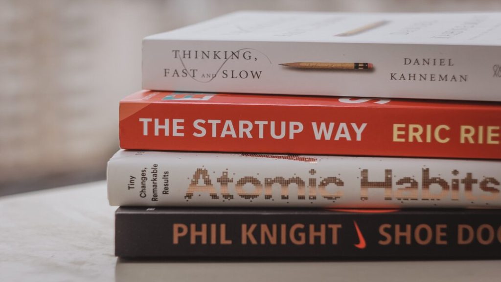 Various books about growing startups and raising funds