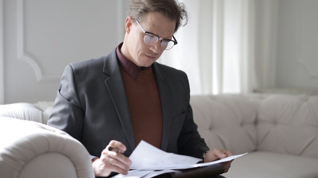 A business owner looking through tax documents