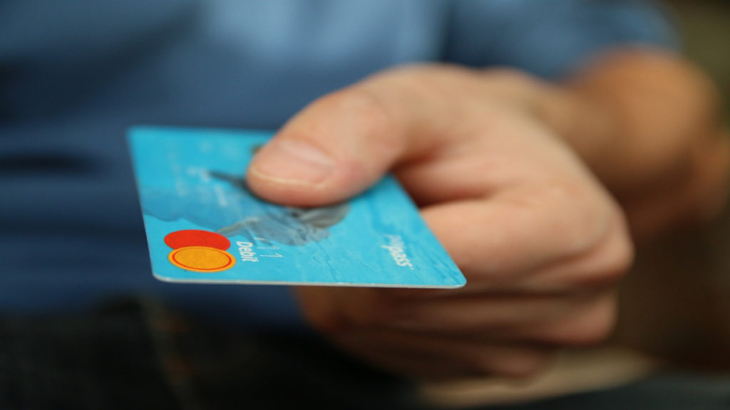 A startup owner paying with a credit card