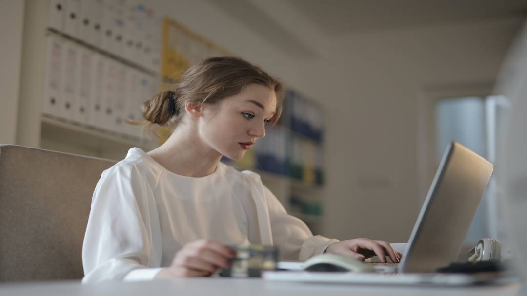 Woman looking at a computer 